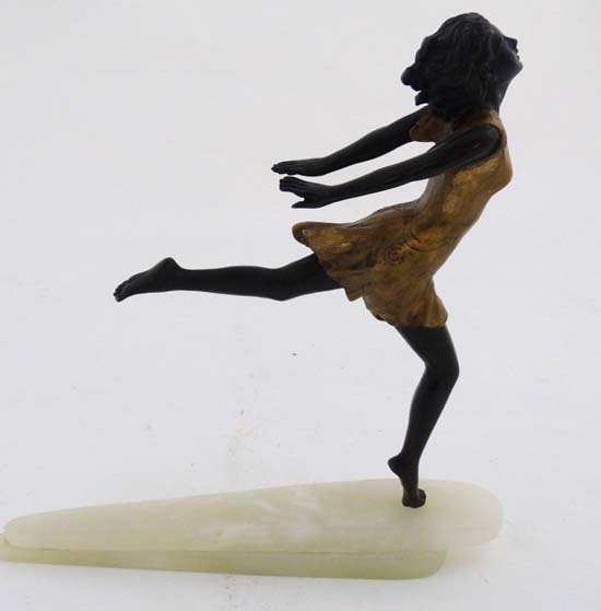 A cast and patinted bronze sculpture in the Art Deco style depicting a young girl upon an - Image 3 of 6