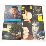 Collectable vinyl records : A selection of six 1960s and later LPs , comprising three by Elvis