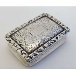 Nathaniel Mills : An early Victorian silver vinaigrette with acanthus scroll and floral decoration