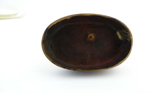 A Regency patinated bronze oval desk weight in the form of a sejant dog. 3 1/4" wide x 2 3/4" - Image 2 of 6