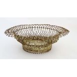 A c.1900 painted wirework basket with rope twist decoration 16" wide  CONDITION: Please Note -  we