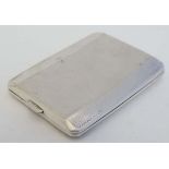 An Art Deco silver match book cover / vesta case with engine turned decoration London 1938 maker