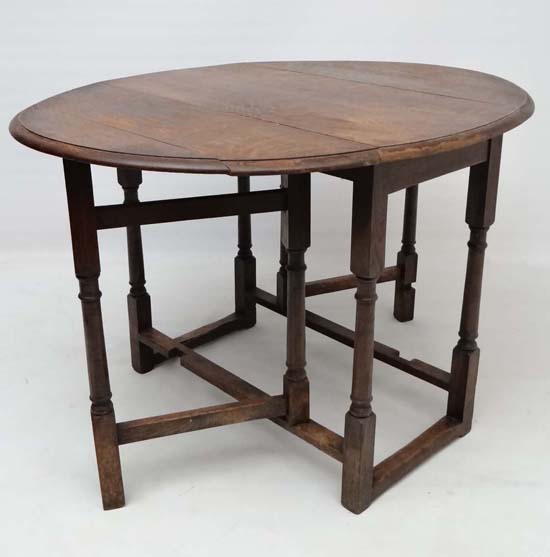 A 1920's oval gate leg table with turned column, legs and supports 36" long  CONDITION: Please - Image 2 of 2