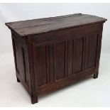 A 17thC large oak peg jointed hinged lidded chest with hand made stud decoration and wire hinges 38"