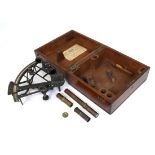 Henry Hughes & Son, Admiralty Instrument Makers : A labelled and mahogany boxed brass sextant. Scale