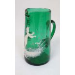 A green glass jug with white painted Mary Gregory style design. 6 1/4'' high. CONDITION: Please Note