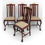 A set of 4 c.1900 Queen Anne style dining chairs having quatrefoil piercing  with drop in seats 40
