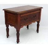 An unusual Victorian oak peg jointed serving table with frieze drawer and Neo-Gothic carving to legs