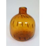 Scandinavian Retro Glass: A mid 20thC Skyrup , Sweden, amber studio art glass bottle vase, having