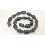 20 large beads with cloisonne enamel decoration . Each bead approx 1 1/2" long  CONDITION: Please