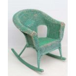 Manner of Lloyd Loom : An unusual 1930's green painted rocking chair approx 32" high  CONDITION: