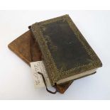 Books: Two leather bound religious books, to include; '' The Gospel according to St Matthew '' ,