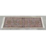 Rug Carpet : An ' Antiqua ' runner with  beige ground and red and blue border 27 x 99".