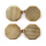 A pair of 9ct gold cufflinks with engine turned decoration 
 CONDITION: Please Note -  we do not