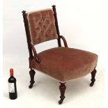 A Victorian walnut button back nursing chair with overstuffed seat 29 1/2" high  CONDITION: Please