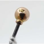 Hat Pin : A hat pin surmounted by a 9ct gold sphere. The whole 6" long  CONDITION: Please Note -  we