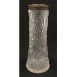 A cut crystal vase with Russian silver rim to top having acanthus and foliate decoration. Marked