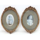 Frames : A pair of oval relief frames with fruiting grapevine decoration, the whole to fit 9 x 7"