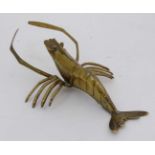 A large brass model in the Oriental style of a crustacean possibly a langoustine  / Norway lobster