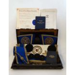 Masonic Regalia : A Spencer's Masonic tin box opening to reveal a quantity of items pertaining to