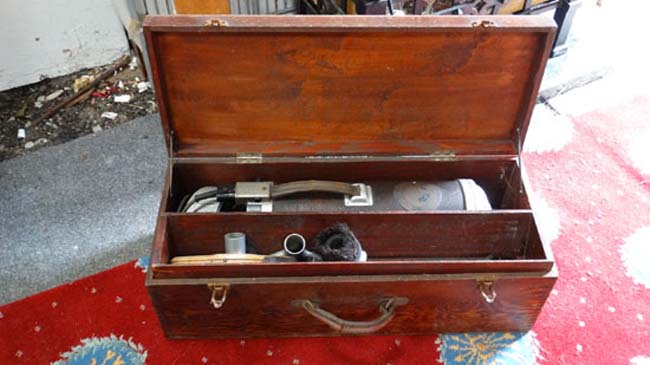 A 1930s Electrolux Ltd wooden boxed vacuum cleaner with accessories  CONDITION: Please Note -  we do