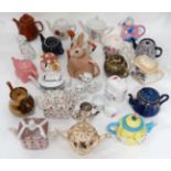 Large collection of novelty teapots CONDITION: Please Note -  we do not make reference to the