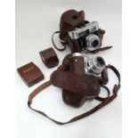 Cameras : two Voitlander cameras ( Vito CLR & VitoB)  together with leather cases, two lens ends and