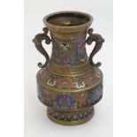 Cloisonné : An Oriental brass vase of baluster form with Cloisonne decoration flared rim flat