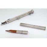 A silver pencil holder/case hallmarked Birmingham 1905 maker Francis Webb. 3" long together with a