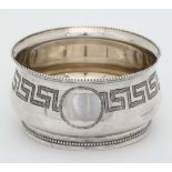 A Victorian silver salt with bead and Greek key decoration. Hallmarked Birmingham 1877 maker