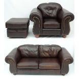 A late 20thC brown leather suite comprising 2-seat sofa and matching armchair and footstool  with