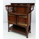 Arts and Crafts : Manner of Shapland and Petter , Barnstaple , an oak buffet , with ornate brass