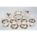 A Royal Albert Old Country Roses pattern tea service to include six cups , saucers and side