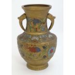 Cloisonné : An Japanese gilt brass vase of baluster form with Cloisonne decoration depicting flowers