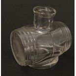 A clear glass ink well in the form of a barrel. 2'' high.  CONDITION: Please Note -  we do not