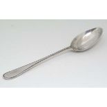 A Victorian silver old English pattern christening spoon with  beaded edge to handle. Hallmarked