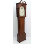 Longcase : a 13 3/4" breakarch mahogany Grandfather clock with ebony stringing , swan neck