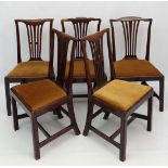 A harlequin set of 5 Country made mahogany dining chairs, each with fretted back splat and drop in