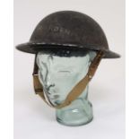 WWII : An Air Raid Patrol Warden's ' Brodie ' helmet , having blackout finish with interior lining