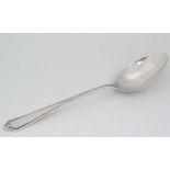 A Japanese Sterling silver dessert spoon by K Uyeda  . Approx 7" long (338g) CONDITION: Please