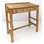 A 19thC pine double clerks desk with 2 drawers foot rest etc. 46" wide x 47" high x 24 1/4" deep