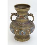 Cloisonné : An Japanese brass vase of baluster form with flared rim and having  Cloisonne banded