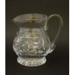 Royal Brierley:  A large cut crystal jug with loop handle. Signed under. Approx 8 3/4" high