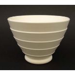 A Keith Murray for Wedgewood '' Moonstone '' bowl in white with banded decoration, having makers