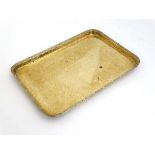 An early 20thC plannished brass oblong shaped tray with ornate border. 10 3/4" x 15 3/4"  CONDITION: