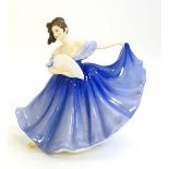 A Royal Doulton figurine from the Pretty Ladies Series entitled Elaine Model HN2791 designed by