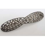 A Continental silver (935) brooch set with profuse marcasite decoration. The whole 3” wide