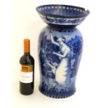 A c1900 Doulton Burslem Morrisian flow blue tall vase / stick stand , decorated with female