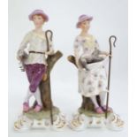 Two 1983 Royal Crown Derby figure groups of a shepherd and shepherdess, complete with crooks and