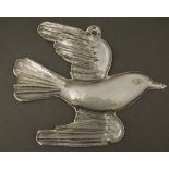 An art glass plaque formed as a stylised bird. Approx 8" high  CONDITION: Please Note -  we do not